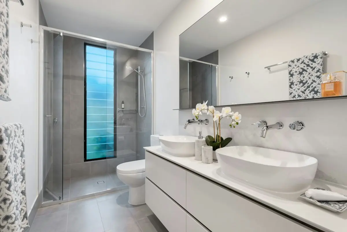 Bright bathroom with walk-in shower and vessel basin